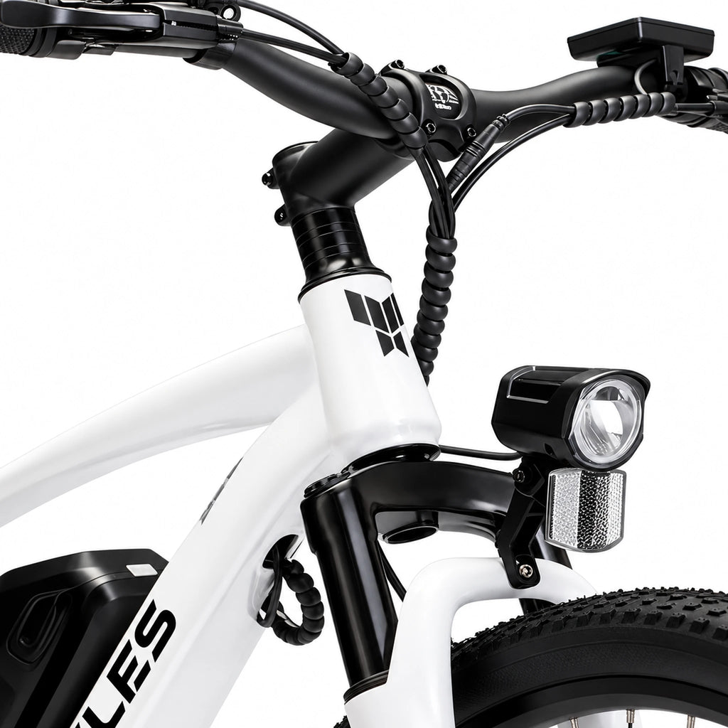 White YOCLES electric mountain bike front suspension, headlight and cockpit detail