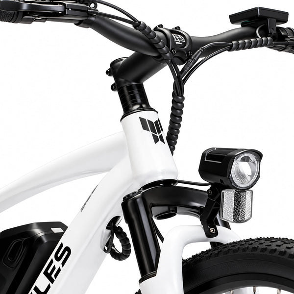 White YOCLES electric mountain bike front suspension, headlight and cockpit detail