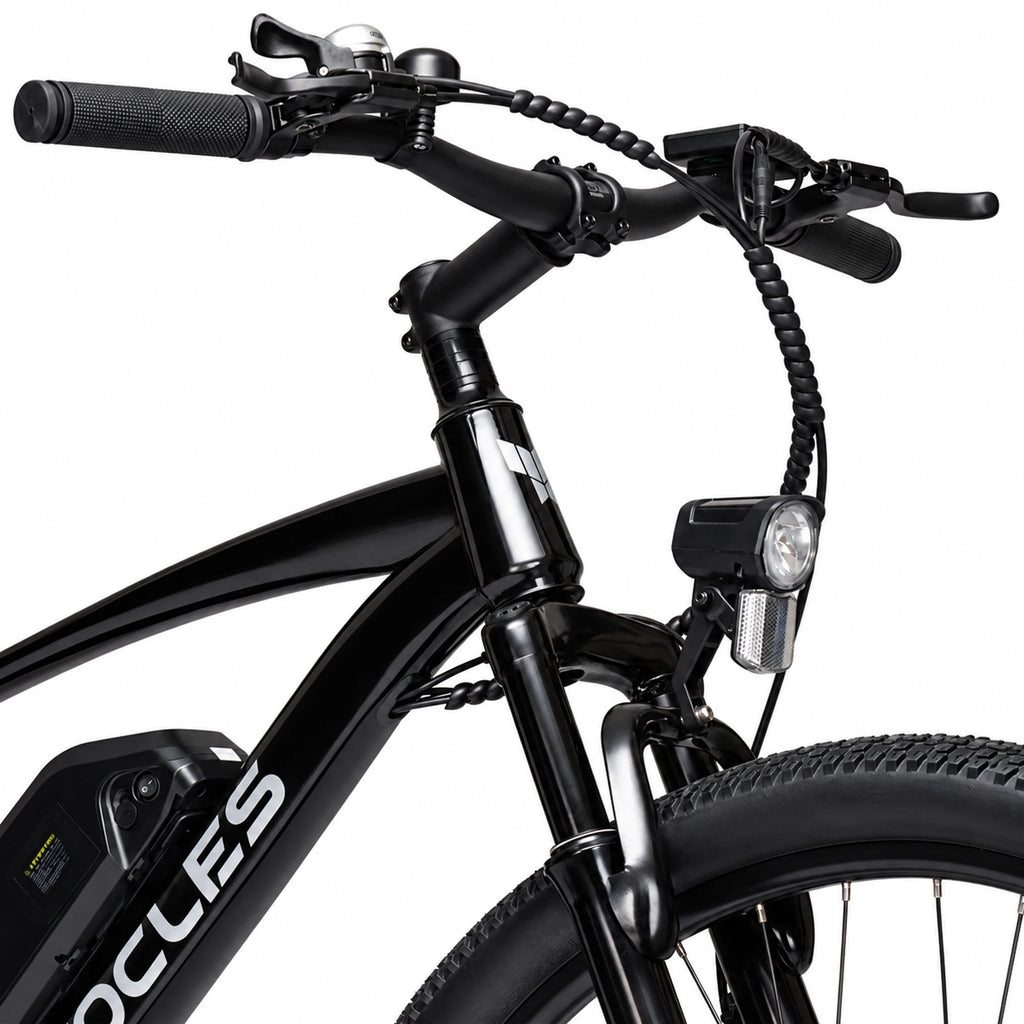 Black YOCLES electric mountain bike cockpit, headlight and suspension detail
